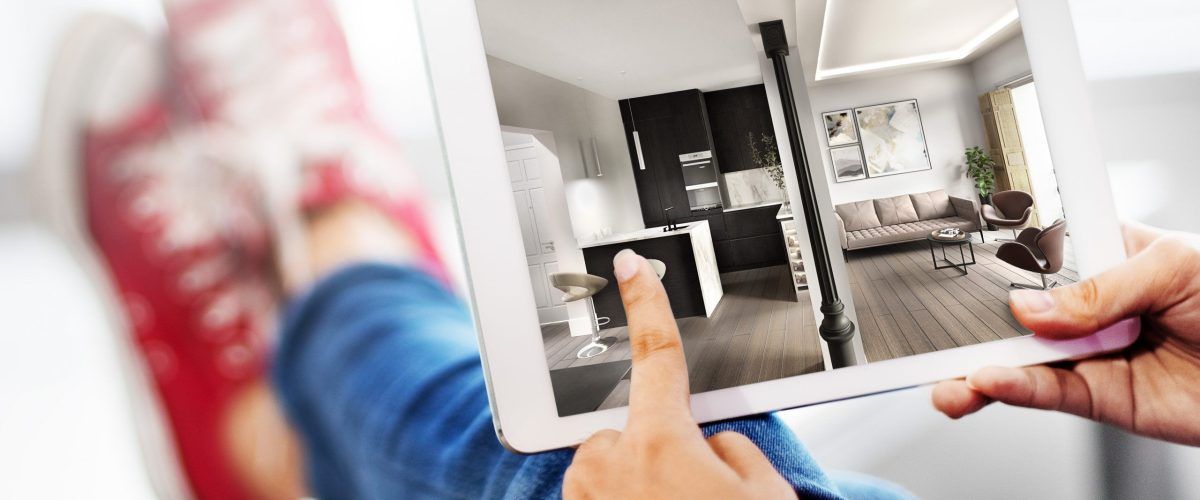Tablet mostrando el render 3D para una propuesta de reforma